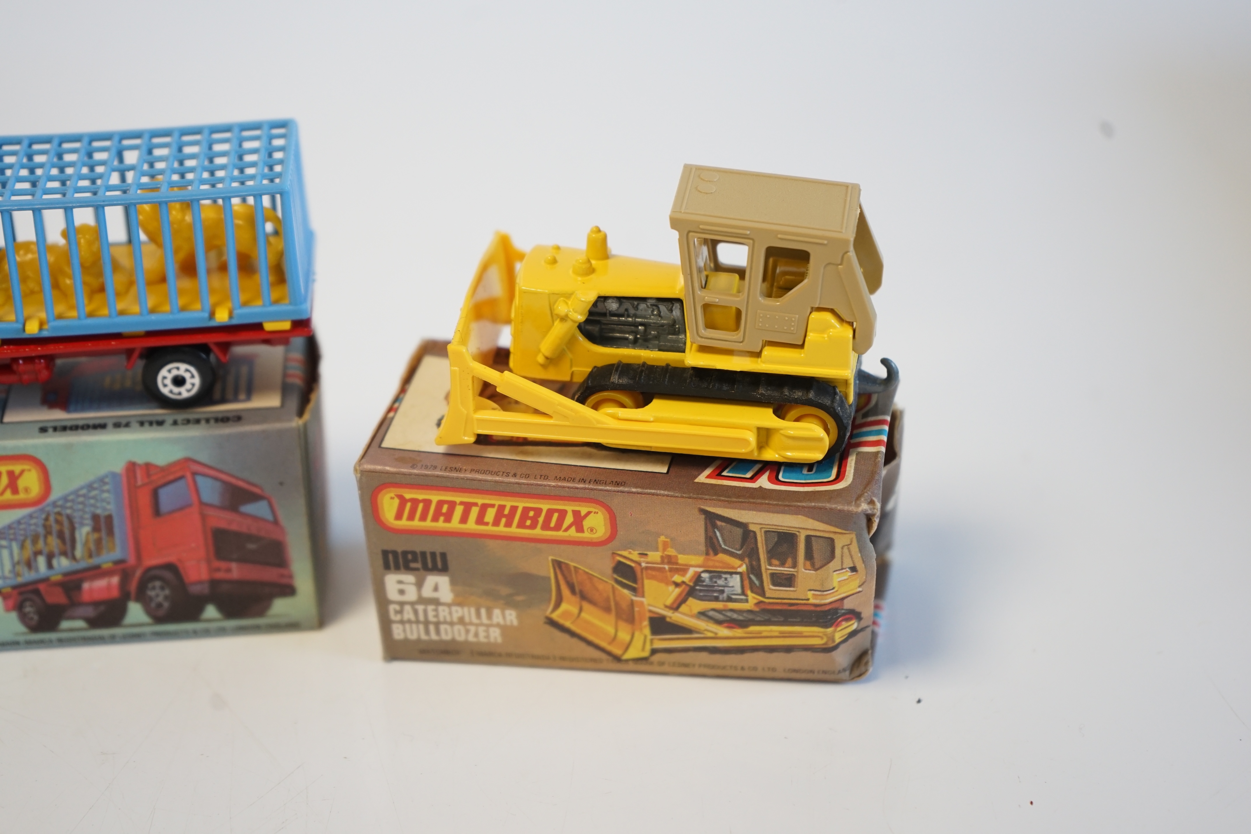 Sixteen boxed Matchbox Series 1-75 diecast vehicles including; 1; Dodge Challenger, 14; Petrol Tanker, 28; Formula Racing Car and another, 34; Chevy Pro Stocker, 35; Zoo Truck and another, 52; Police Launch, 61; Wreck Tr